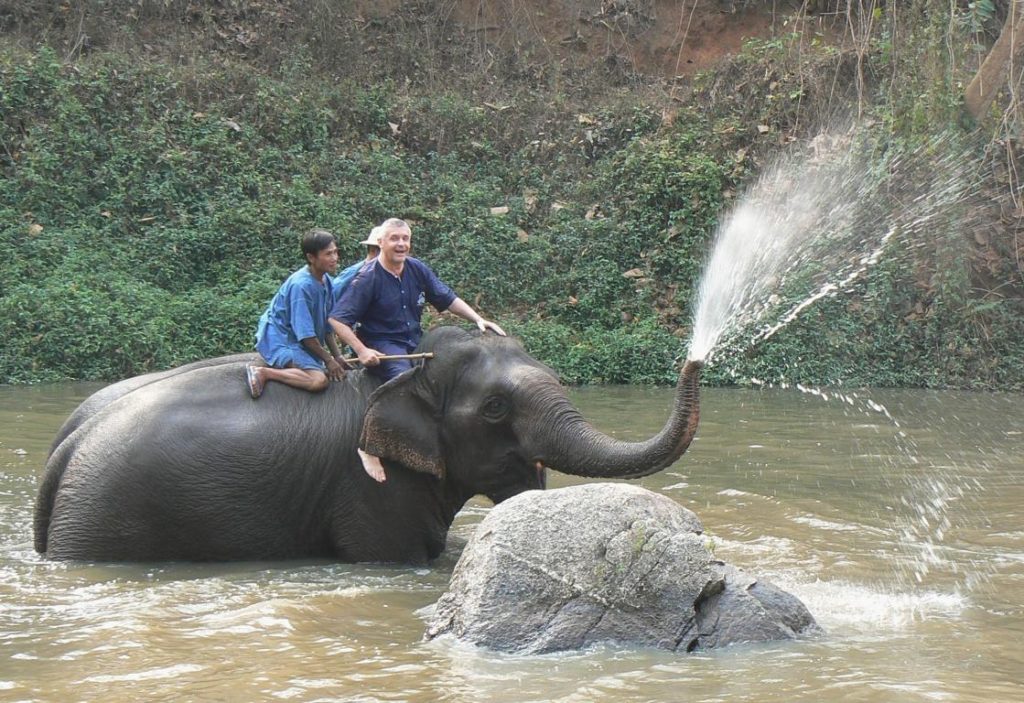 Blowing water by an elephant can be triggered by a pull with the bullhook