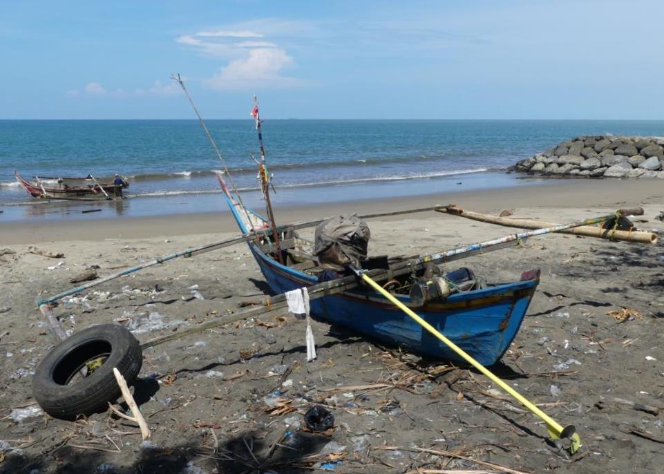 Fishing boat for seine netting from the shore at Padang Beach