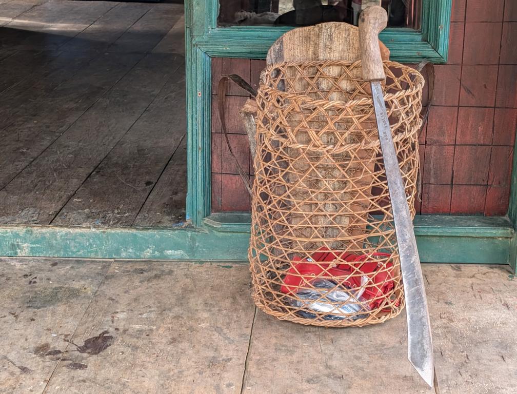 Mentawai Opa rattan carrying basket and Lugguk machete.