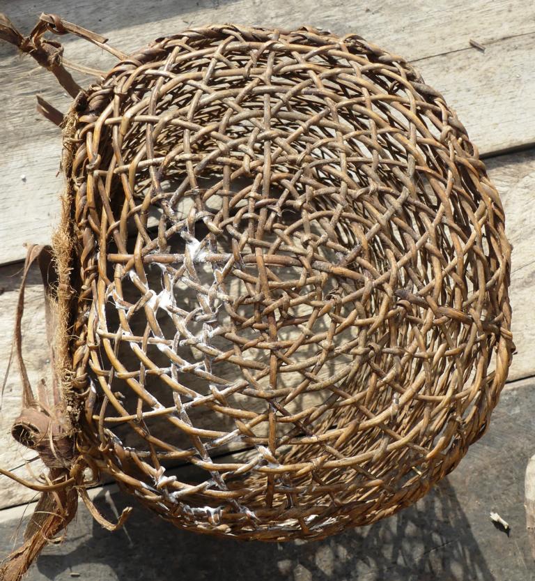 Bottom of O'orek rattan carrying basket