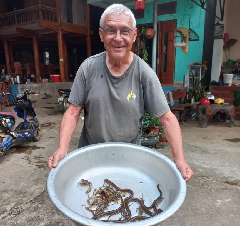 Kurt Hoelzl with some of the trapped eels caught overnight