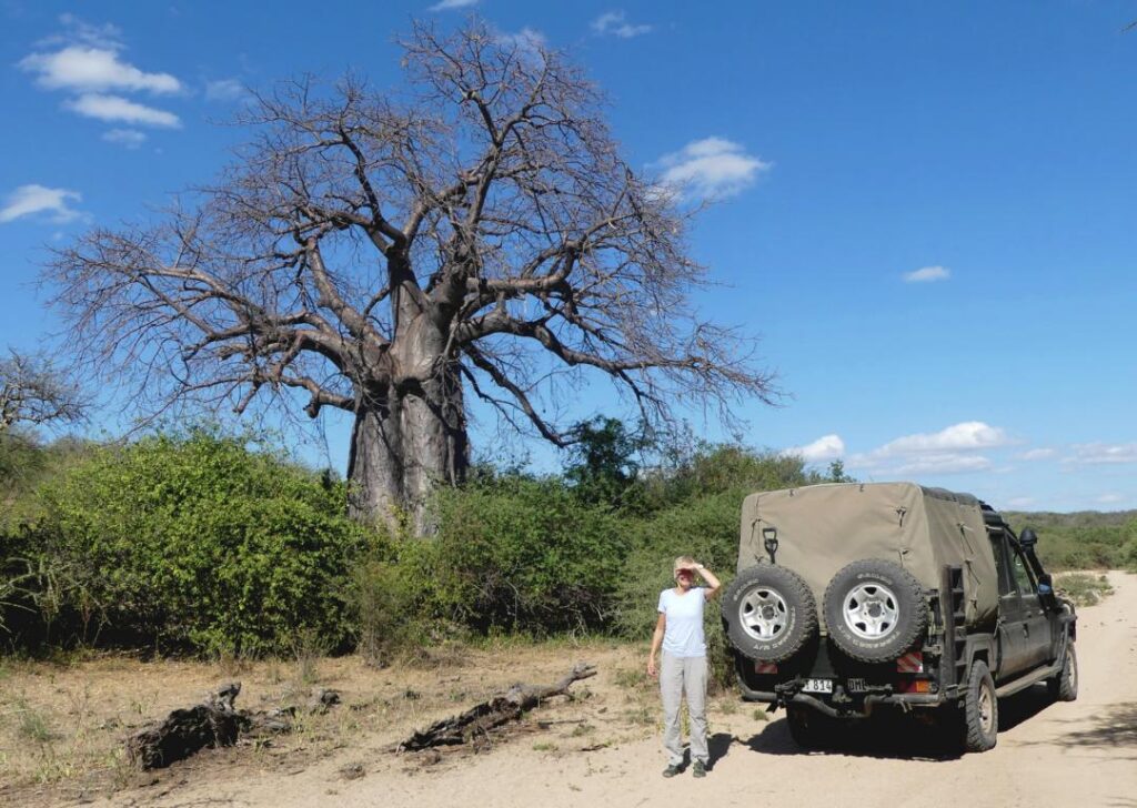 Barbara Hoelzl in front of a Baobab tree