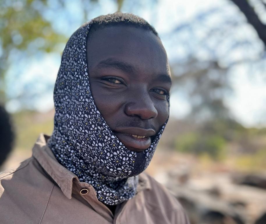 Protecting ears and nose against sweat bees on Hadza land