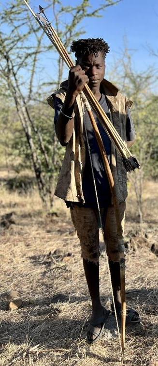 Hadza hunter with his bow and arrows