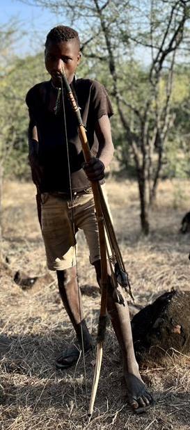 Hadza hunter with his bow