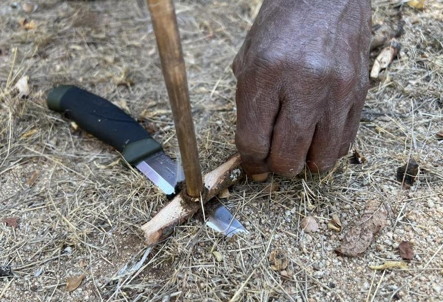 Hadza hand drill friction fire setup