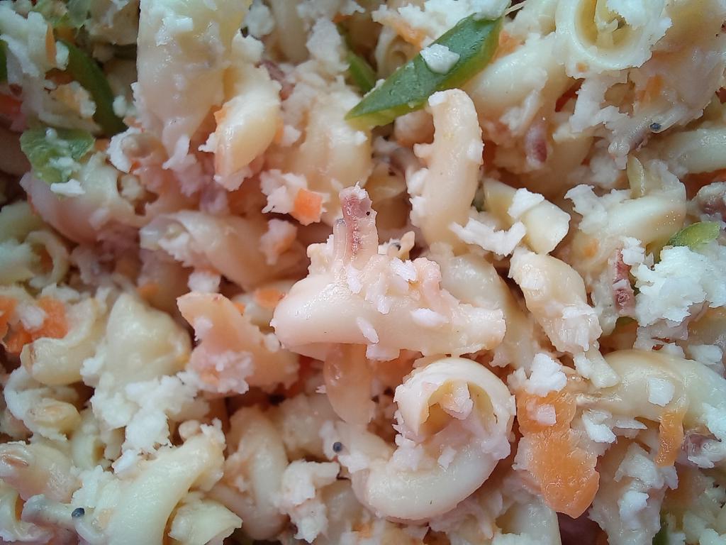 Conch meat with coconut flakes and vegetables in Zanzibar