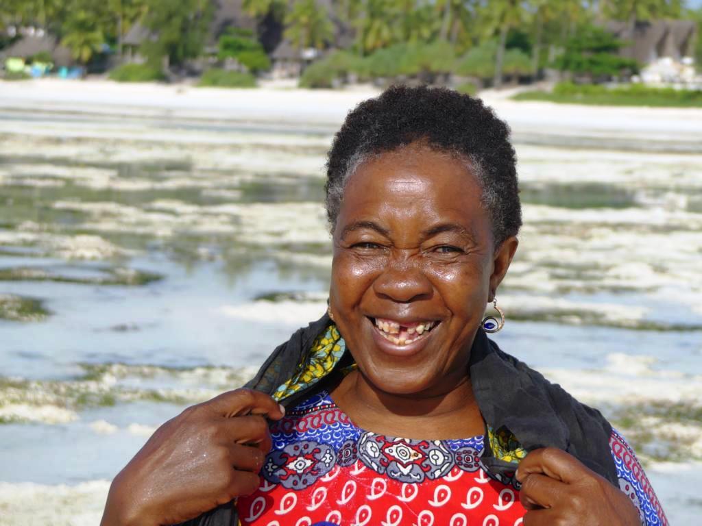 Female coastal forager and trading lady at the coast of Zanzibar