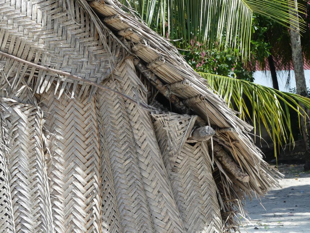 Roof thatching with Makuti panels.