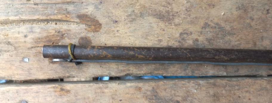 The barrel of an improvised firearm