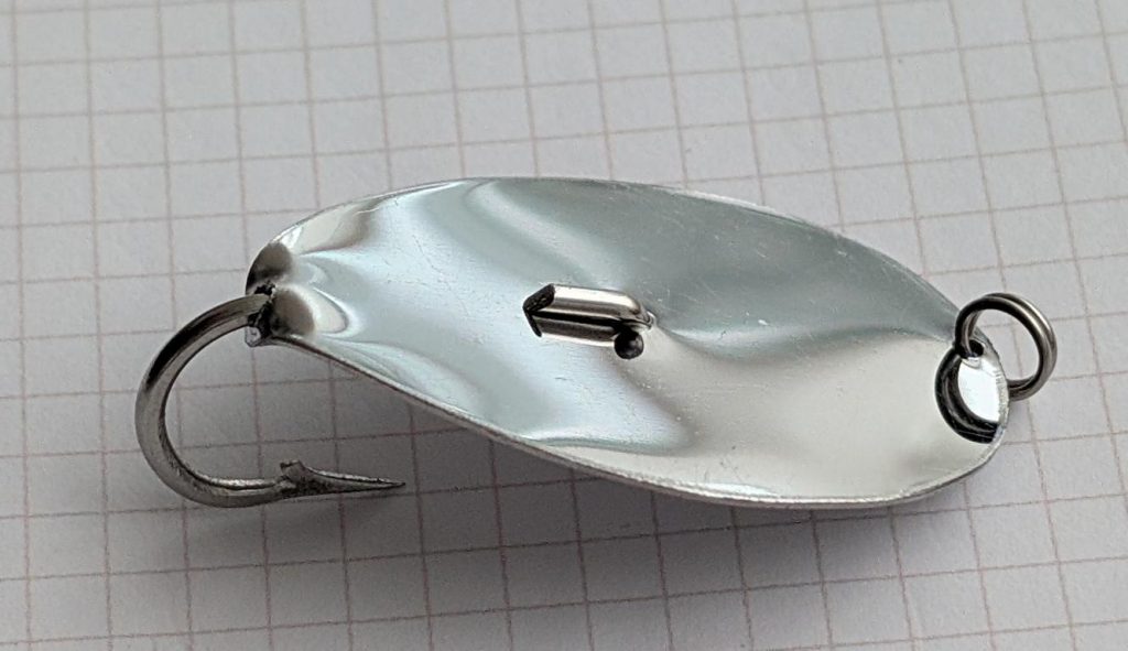 Back side of a fishing spoon from Lolak Handcraft